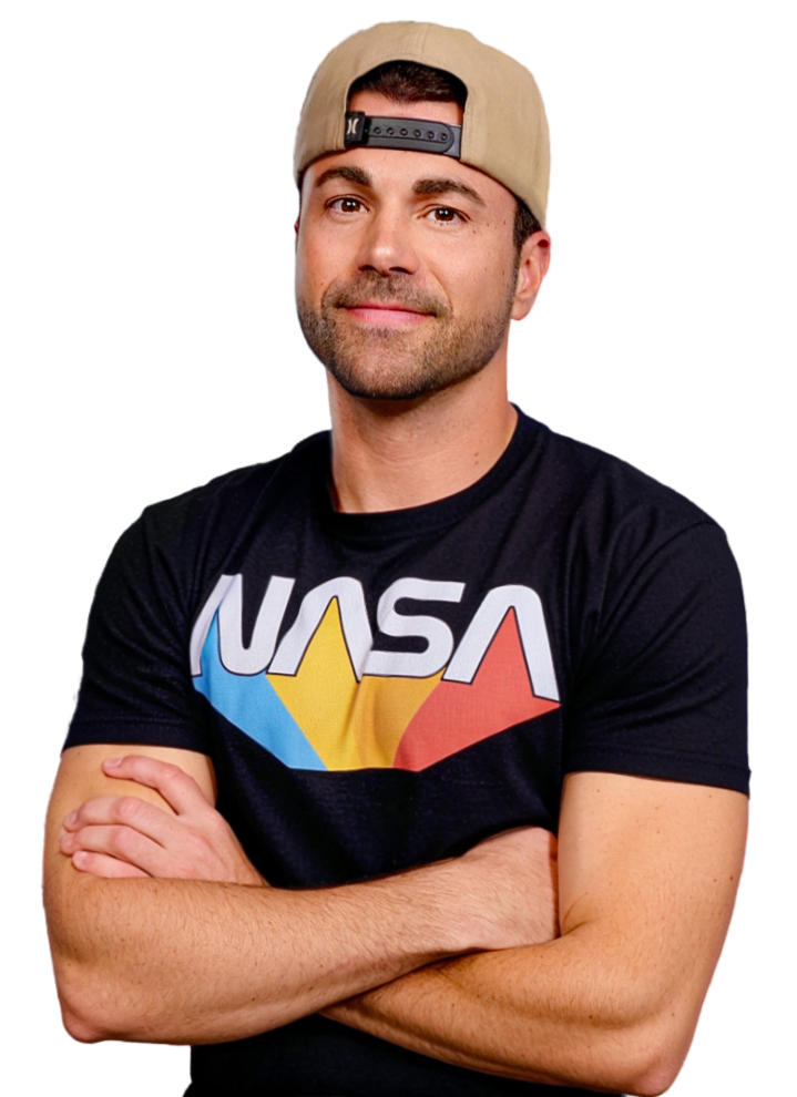 Mark Rober wearing a NASA shirt with his arms crossed